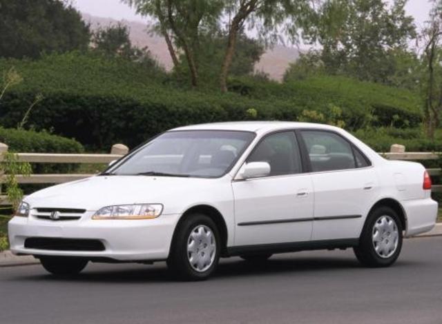 Buy an older car for kid(s)