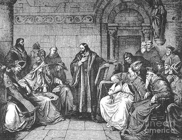 Council of Constance burns Hus and ends Great Schism