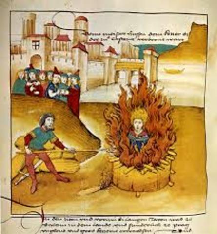 Council of Constance  burns Hus and ends Great Schism