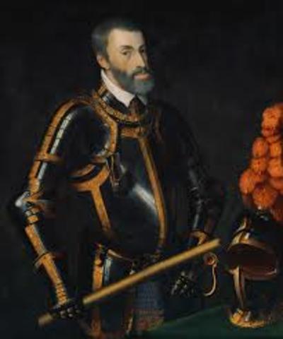 Peace of Augsburg ends religious war in Germany; Charles V abdicates
