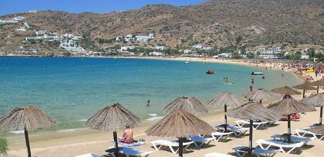 Take bus to Piraeus port from Athens airport.