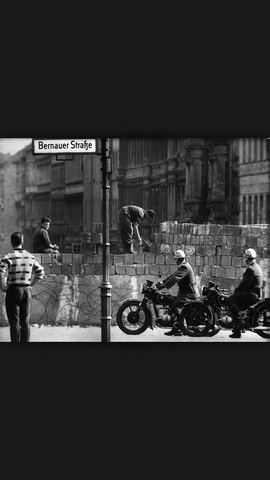 Berlin Wall falls and collapse of communism