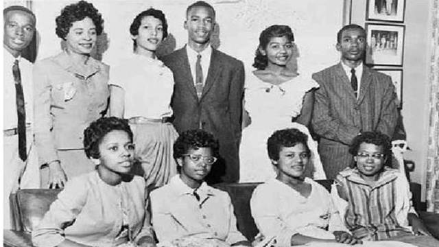Nine African-American students in Arkansas (nicknamed the Arkansas Nine) attend a previously all-white high school. Army troops are brought in to protect them.