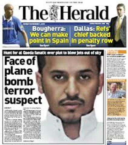 Passengers and crew of an American Airlines flight from Paris to Miami subdue Richard Reid after he attempts to light a bomb hidden inside his shoe.