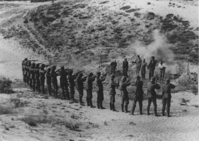 Einsatzgruppen (mobile killing units) shoot nearly 3,000 Jews at the Seventh Fort, one of the 19th-century fortifications surrounding Kovno.