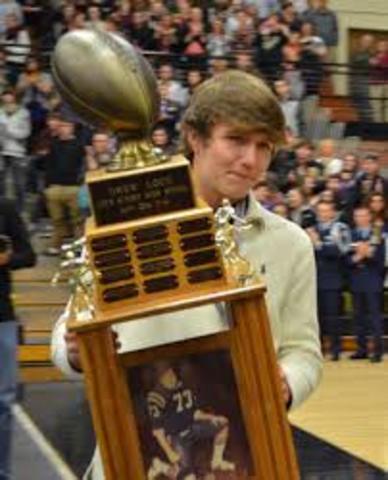 Pass for 2500 yards and rush for 500 yards.