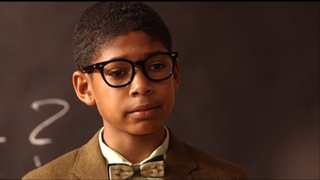 Kenny reads in front of byrons class