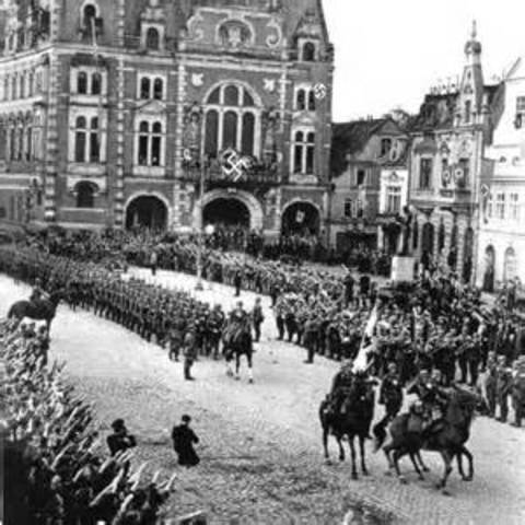 1936 Hitler sends troops into Rhineland of Germany in violation of the Versailles Treaty