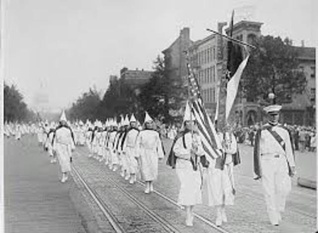 Ku Klux Klan members stage a major march through Washington, D.C.Scopes trial takes place in Dayton, Tennessee.
