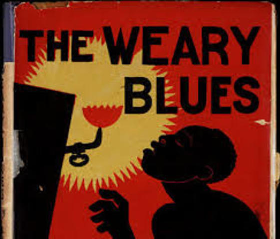 Langston Hughes publishes “The Weary Blues.”