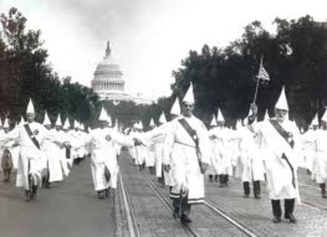 Ku Klux Klan members stage a major march through Washington, D.C.Scopes trial takes place in Dayton, Tennessee.