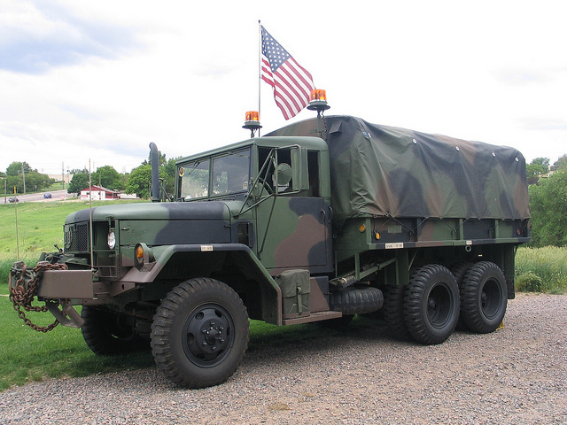 Chrysler, Ford, and General Motors convert to military production.