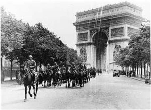 Germany invades France and forces it to surrender