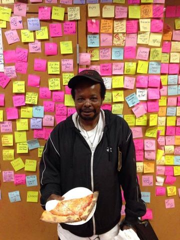 Pizza restaurant offers free pizza to the homeless