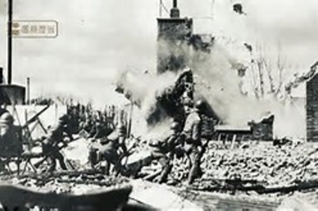 Japan’s army pillages Nanjing, China; massacre