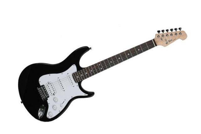 Me compro mi primera guitarra electrica.