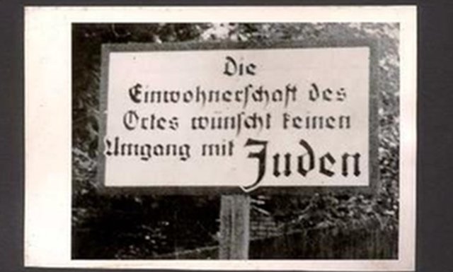 First Anti-Semitic law is passed in Germany