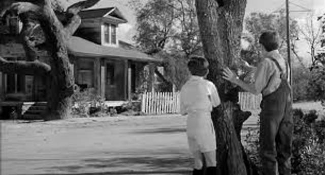 Scout talks to Miss Maudie about Boo Radley.