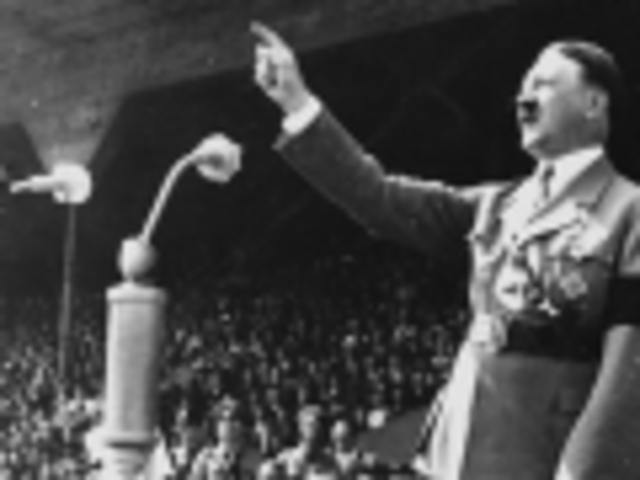 Hitler openly announces to his cabinet he will defy the Treaty of Versailles