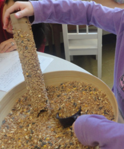Jane making bird feeder