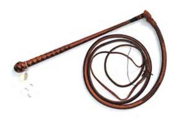 Elie is whipped by his Kommando