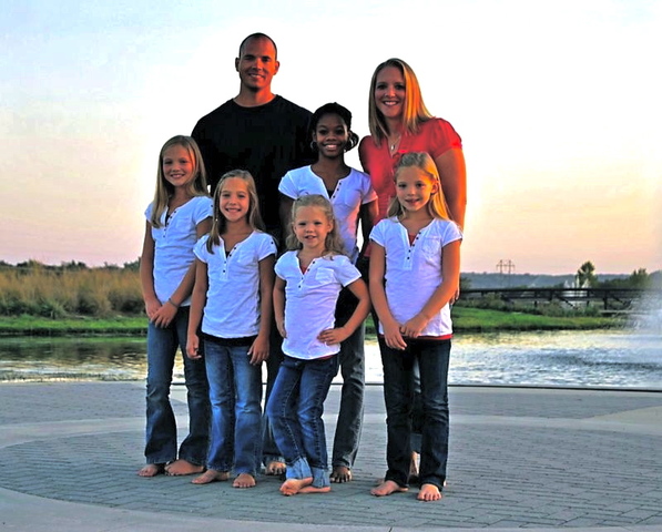 Moves in with host family