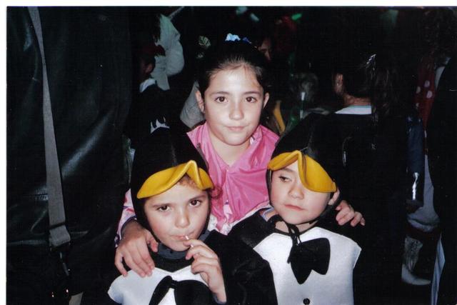 En carnavales disfrazada de sevillana.