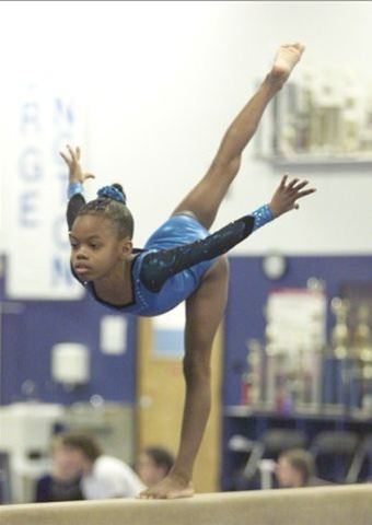 Gabby is taught a cartwheel