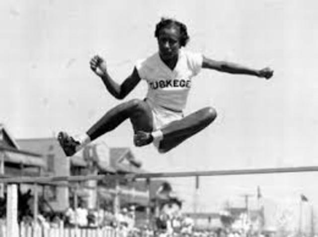 Alice Coachman wins an Olympic gold medal