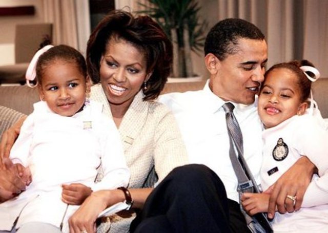 Michelle, Barack and her two daughters.
