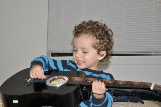 The first time I was playing the guitar