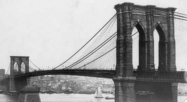 The Brooklyn Bridge opens.