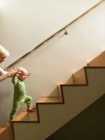 Walks up stairs with help