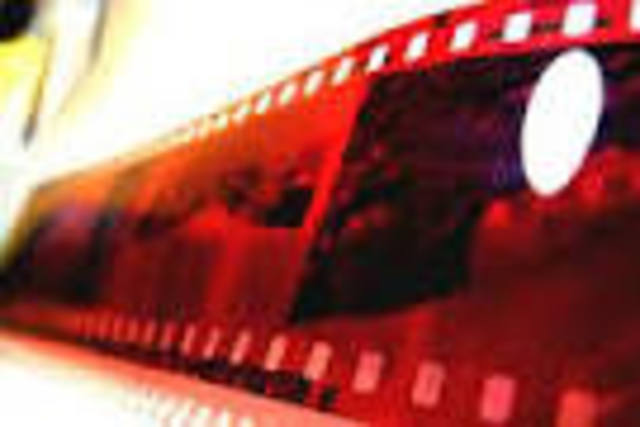 cámara fotográfica con rollo de acetato de celulosa