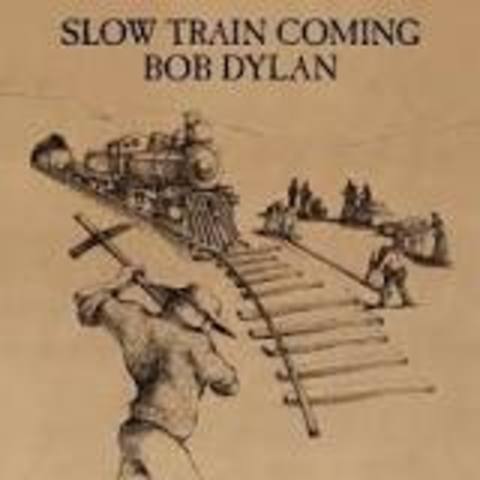Release of Slow Train coming and he starts to convert to christianity