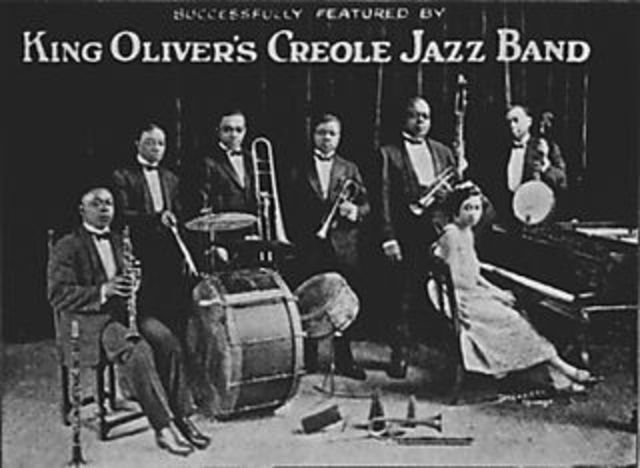 Louis Armstrong joins jazz band in Chicago