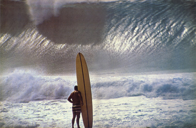Greg Noll surfs waimea