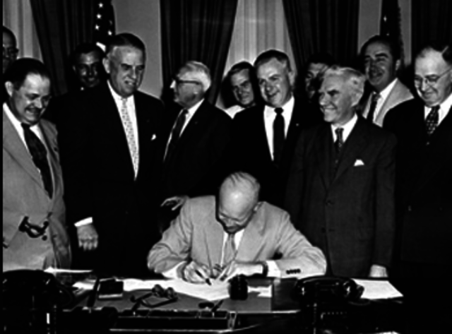 The Treaty of Versailles officially ends WWI.