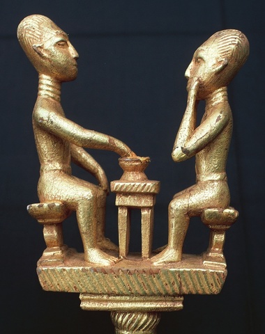 Linguists staff of two men sitting at a table of food