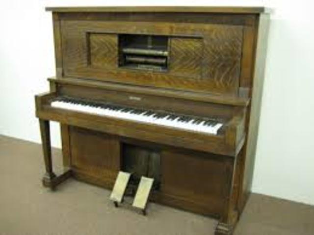 Player piano using electricity