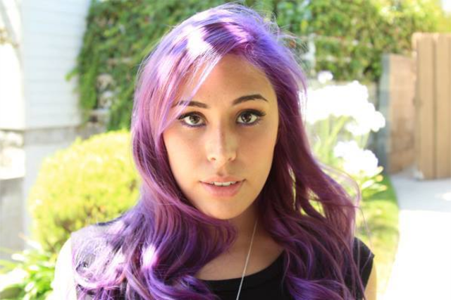 First seen with her signiture purple hair color
