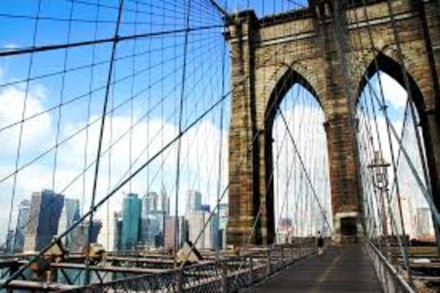 The Brooklyn Bridge opens