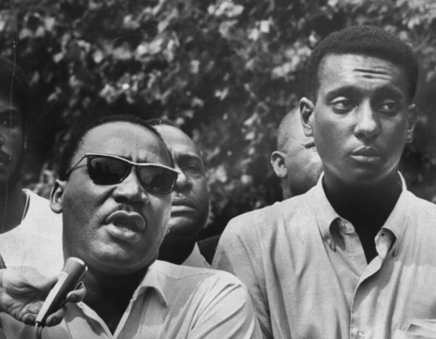 Lead a group of protesters through the streets of Washington D.C demanding buisnesses be closed out of respect for Martin Luther Kings assationation