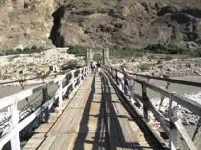 Mortenson and the villigers of Korphe build the Braldu River Bridge so that students would not have to zipline to the school in Korphe.