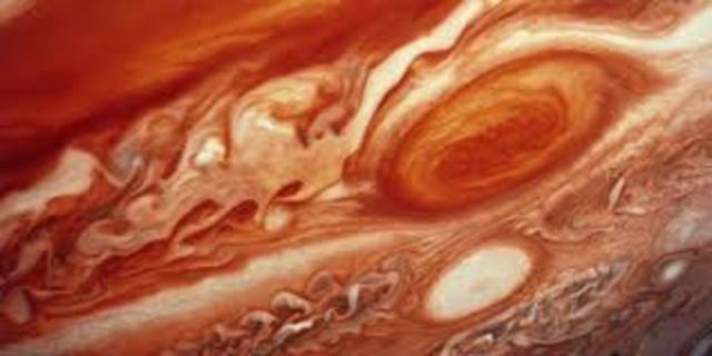 The Great Red Spot on Jupiter becomes prominent.