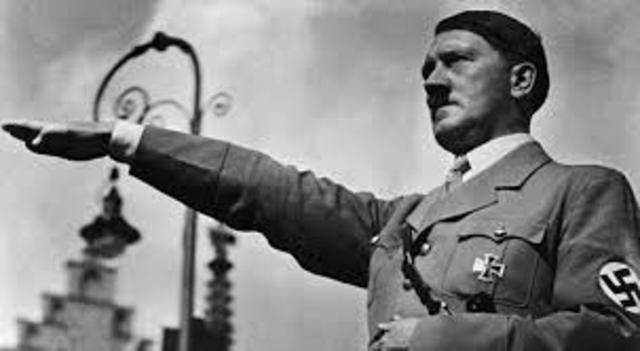 Hitler announces Germany will not obey Treaty of Versailles