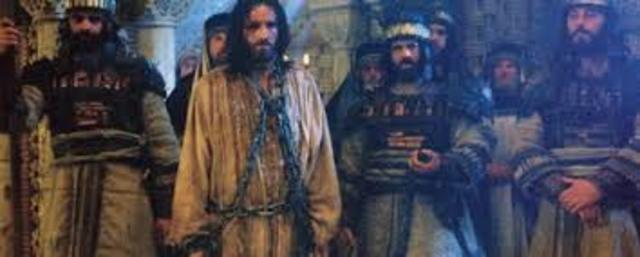 Jesus arrested in the garden of Gethsemane.