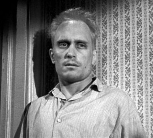 Boo Radley saves Scout and Jem from Bob Ewell