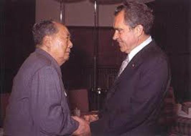 Nixon visits China.