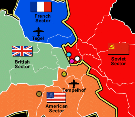 Soviet-controlled East Germany divides Berlin with the Berlin Wall.